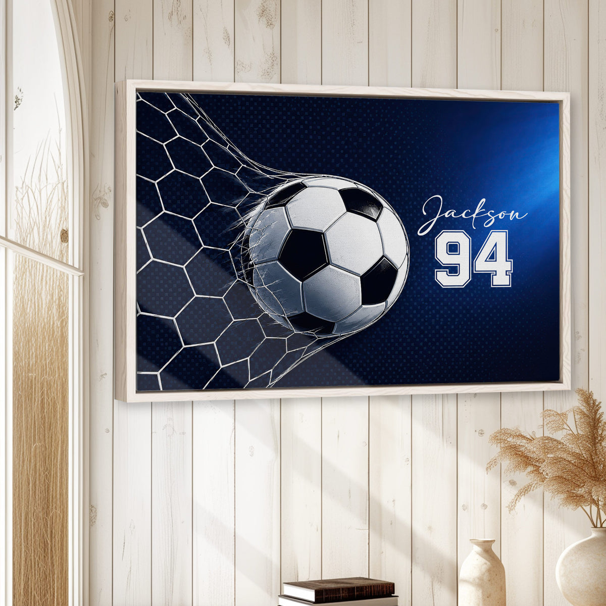 Soccer wall art displayed in a bright room with white wood walls and a natural wood frame