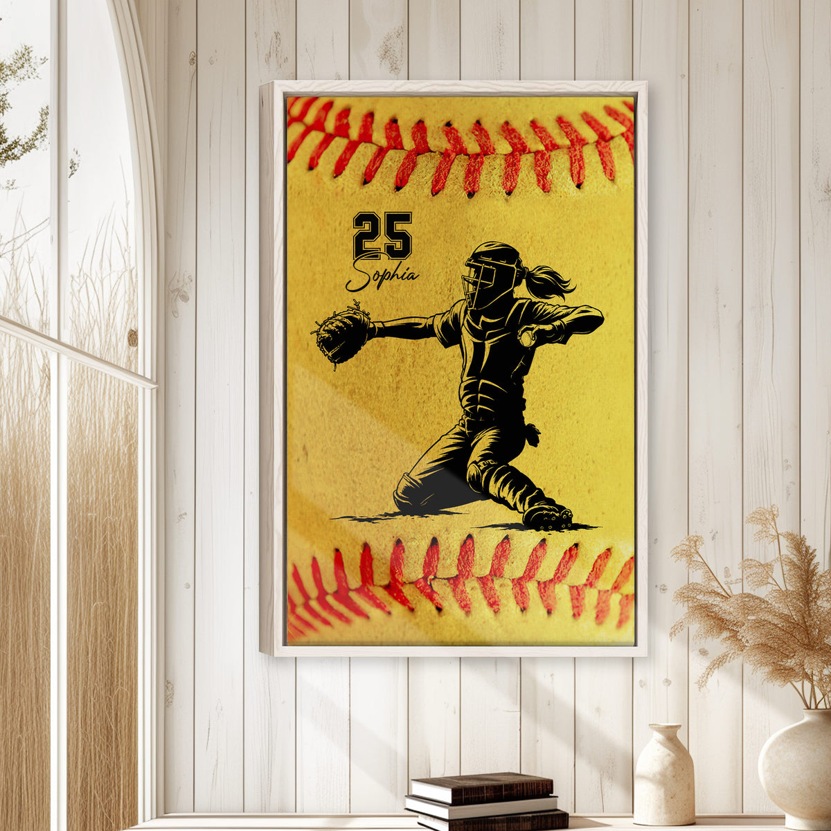 Framed softball catcher wall art displayed on a bright white wood-paneled wall