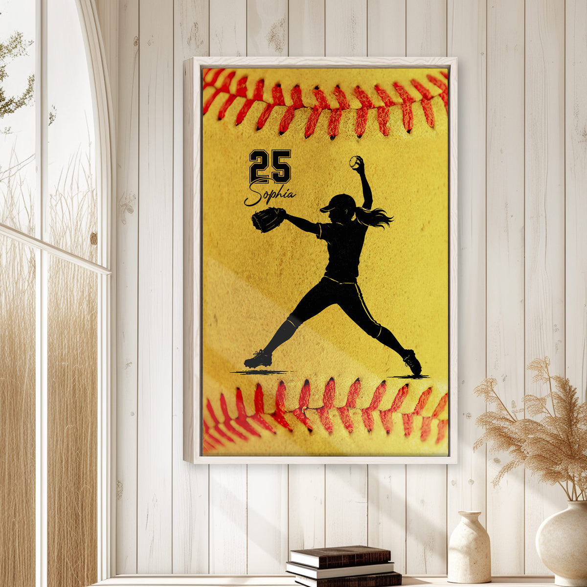 Softball player wall art displayed on a light wood-paneled wall in a bright home decor setting