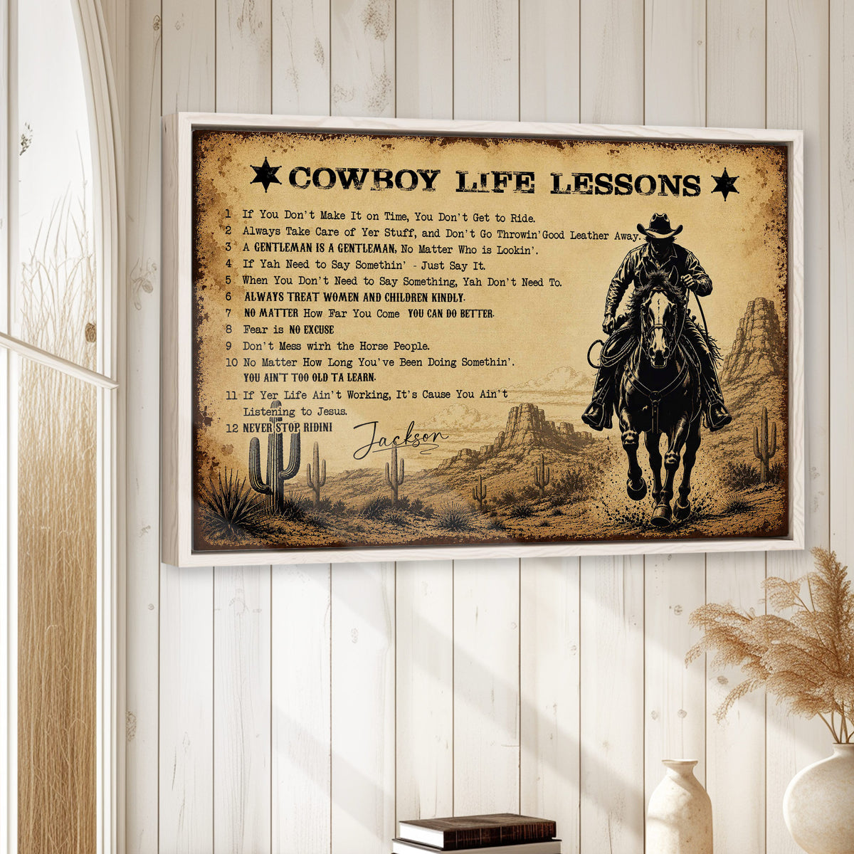 Cowboy canvas wall art displayed on a light wood wall in a Western-inspired home interior