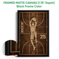 Black framed canvas basketball wall art with a dunking player and close-up frame detail