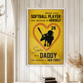 Softball wall art displayed on a light wood paneled wall in a warm home decor setting