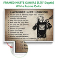 Framed matte canvas lacrosse wall art shown with a white frame and close-up artwork detail