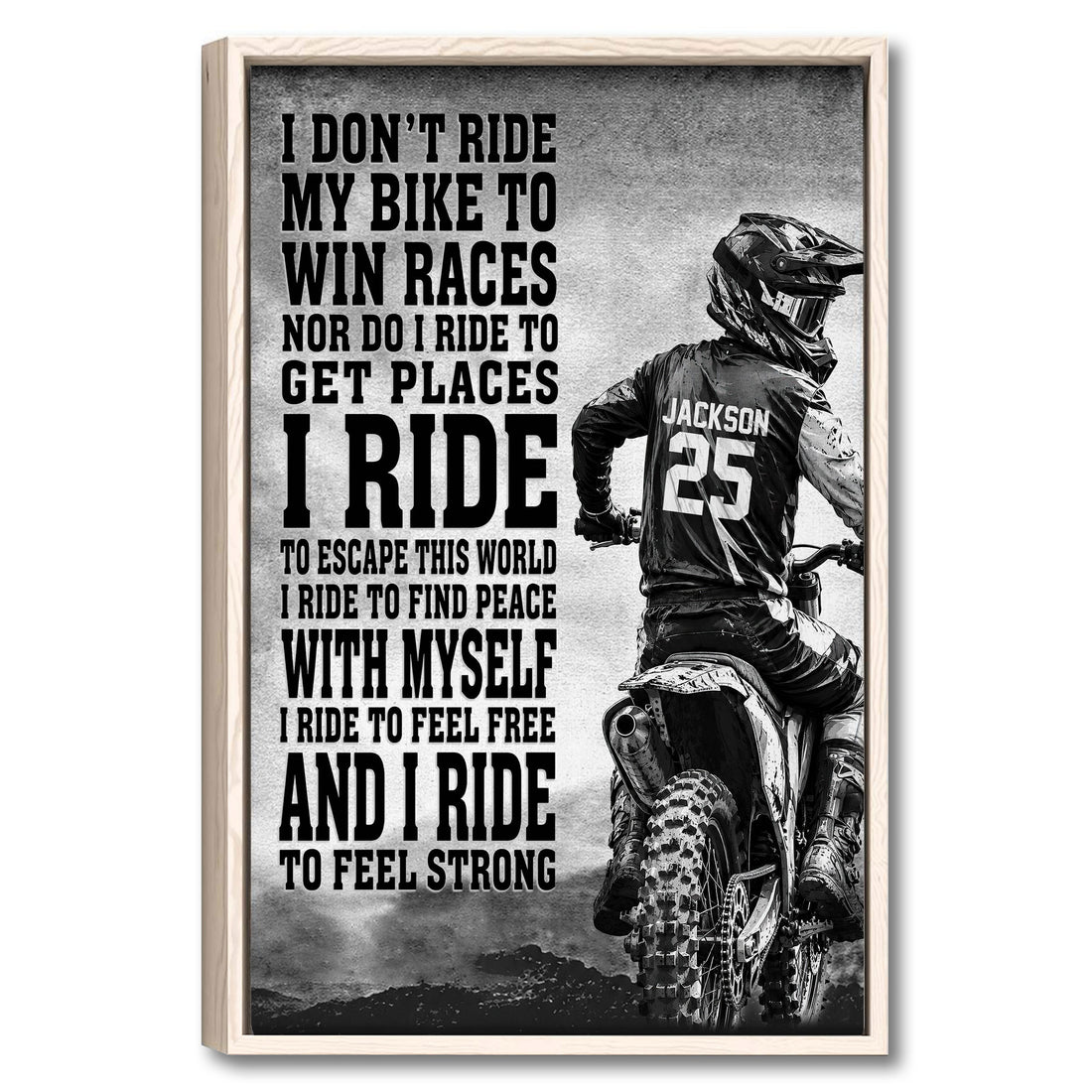 Framed motocross wall art featuring a helmeted dirt bike rider and bold black-and-white racing design