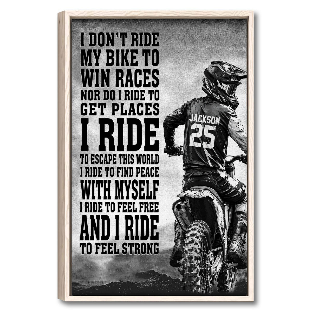 Framed motocross wall art featuring a helmeted dirt bike rider and bold black-and-white racing design