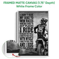 White framed motocross canvas featuring a dirt bike rider, black typography, and textured grayscale artwork