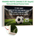 Natural wood framed soccer canvas featuring a stadium field, soccer ball, and motivational sports design