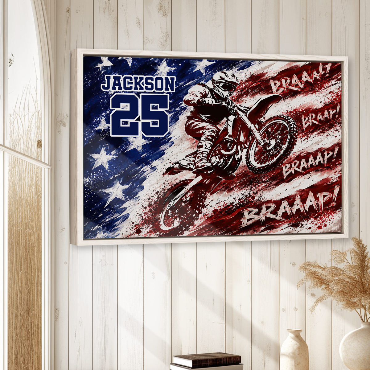 Motocross wall art displayed in a bright wood-paneled room above a shelf with neutral decor