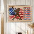 Softball player wall art displayed on a light wood wall in a bright home decor setting
