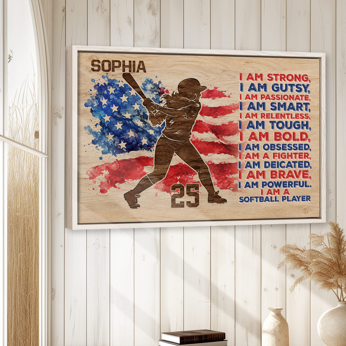 Softball player wall art displayed on a light wood wall in a bright home decor setting