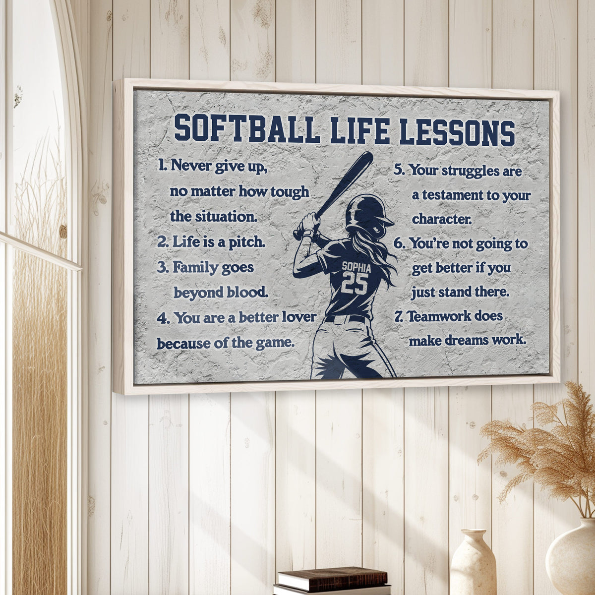 Softball wall art displayed on a light wood-paneled wall in a bright home setting