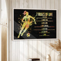 Framed soccer wall art displayed on a light wood-paneled wall in a bright home interior
