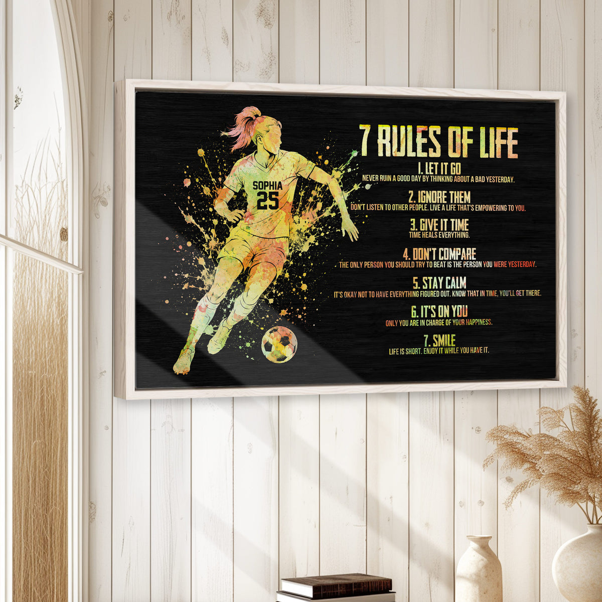 Framed soccer wall art displayed on a light wood-paneled wall in a bright home interior