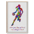 Framed basketball wall art featuring a colorful female player silhouette holding a basketball