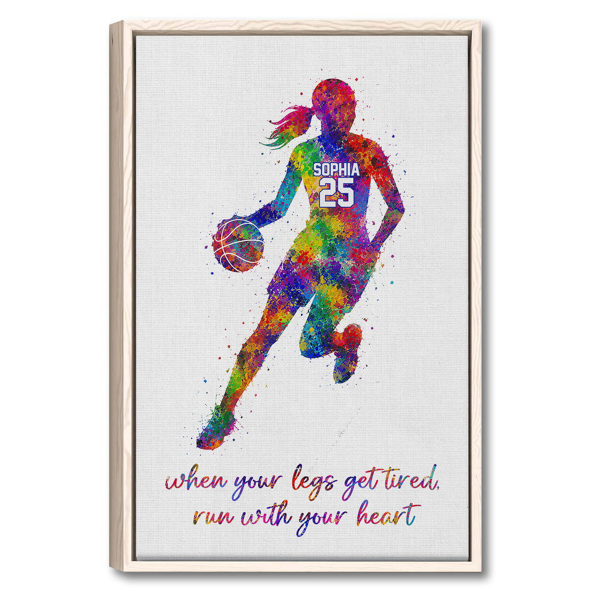 Framed basketball wall art featuring a colorful female player silhouette holding a basketball