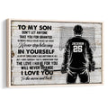 Framed hockey wall art showing a goalie from behind beside an inspirational message on a distressed wood-style background