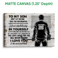 Matte canvas hockey wall art featuring a goalie, hockey net, and bold inspirational typography