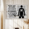 Natural wood framed hockey wall art displayed on a light paneled wall in a home interior