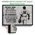 Black framed baseball canvas wall art with an inspirational message and player silhouette holding a glove