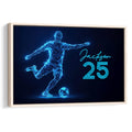 Framed soccer wall art featuring a glowing blue geometric player and ball on a dark background