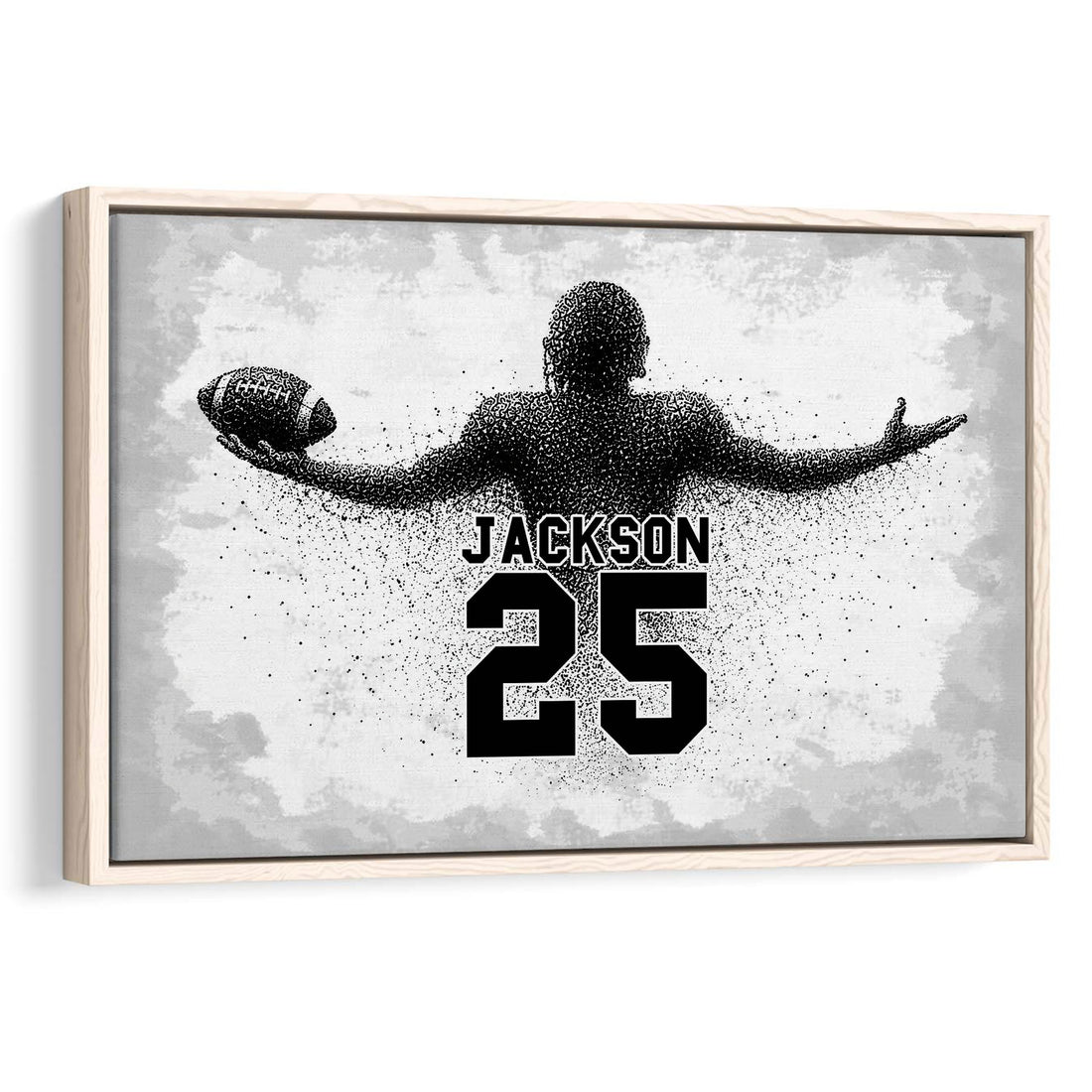 Framed football wall art featuring a monochrome player silhouette holding a football