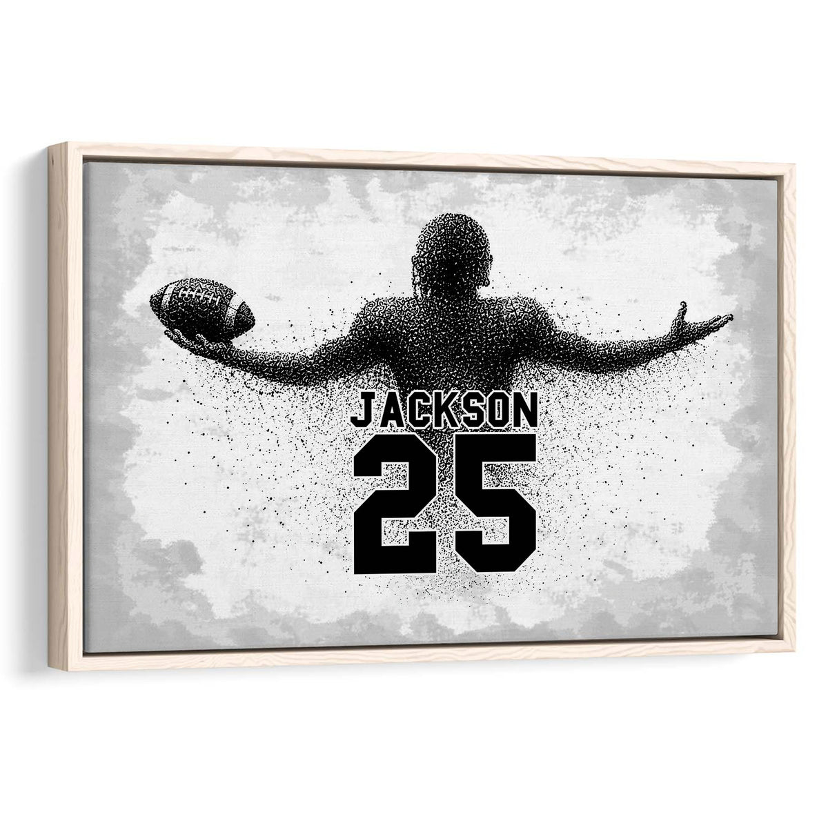 Framed football wall art featuring a monochrome player silhouette holding a football