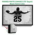 Framed football canvas wall art with a black frame and close-up canvas detail