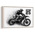 Framed motocross wall art showing a dirt bike rider in a bold black and white splatter design