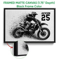 Black framed canvas wall art showing a motocross dirt bike rider with a close-up of the frame edge