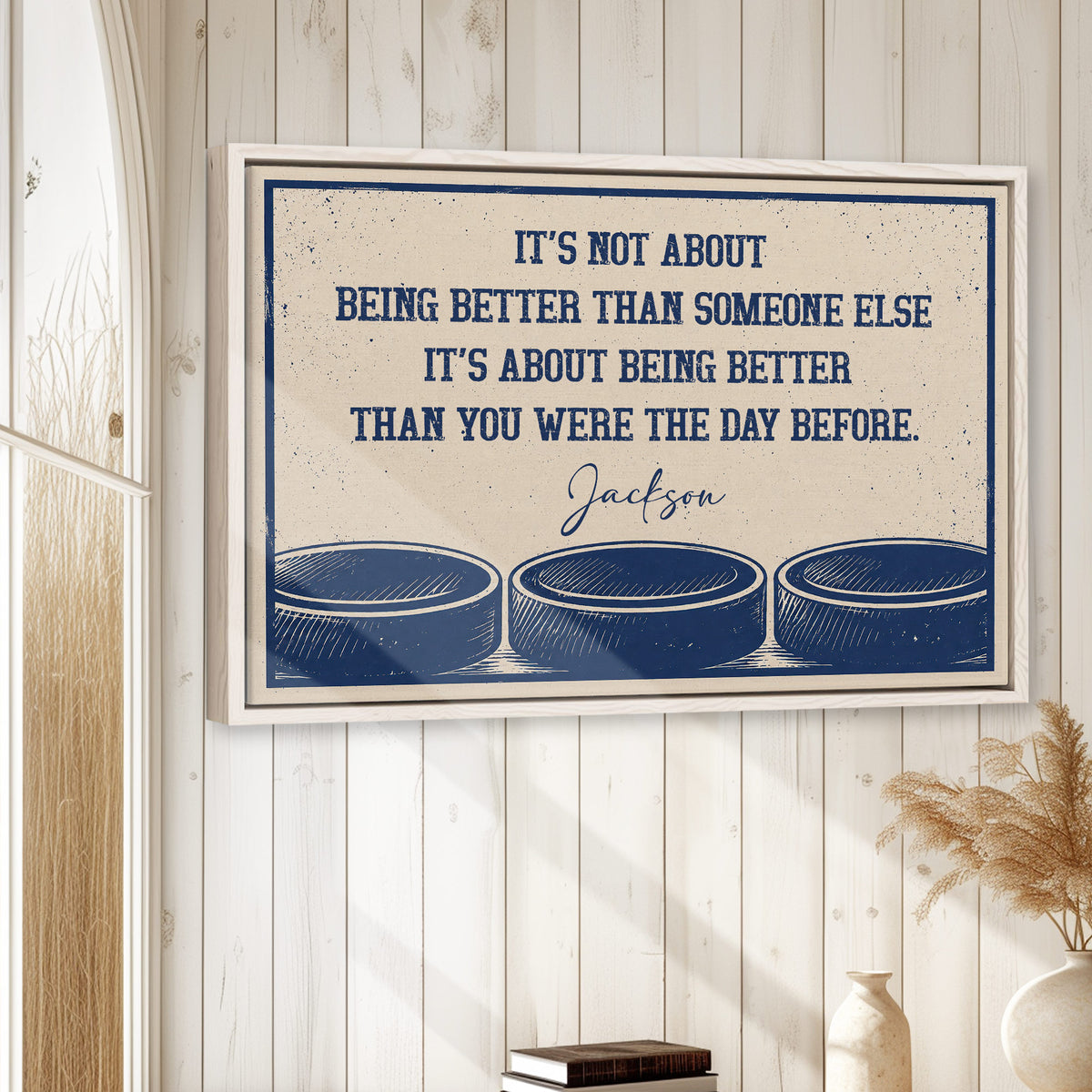 Hockey wall art displayed in a bright room with white wood walls and a natural wood frame