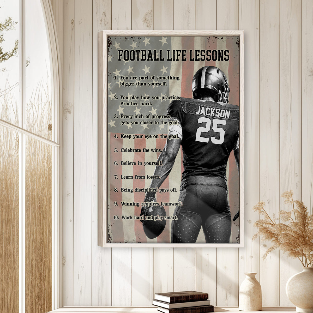 Framed football wall art displayed in a bright home with white wood walls and neutral decor