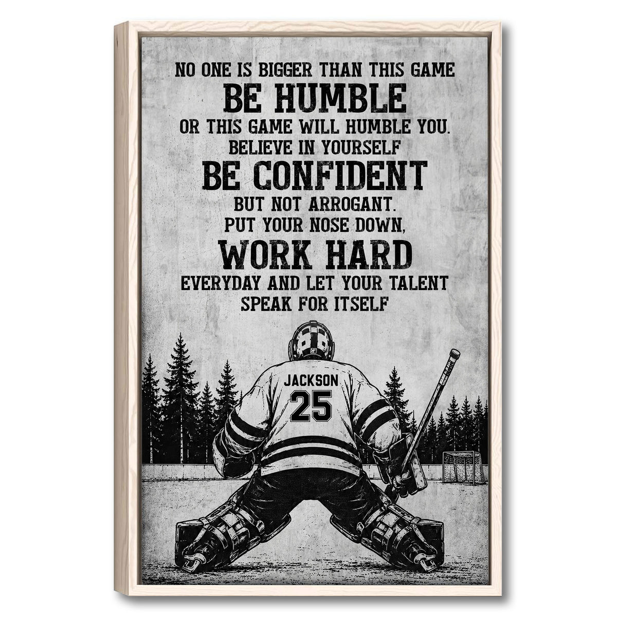Framed hockey wall art with a motivational message, goalie illustration, hockey stick, and forest background