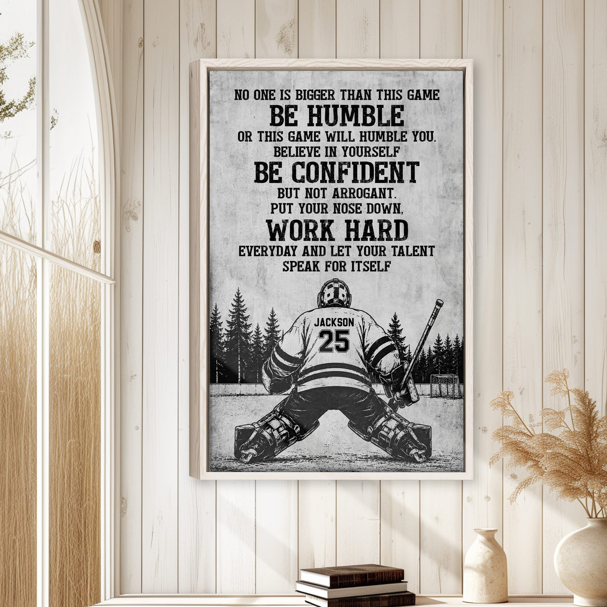 Hockey motivational wall art displayed in a bright room with white paneled walls and natural wood decor