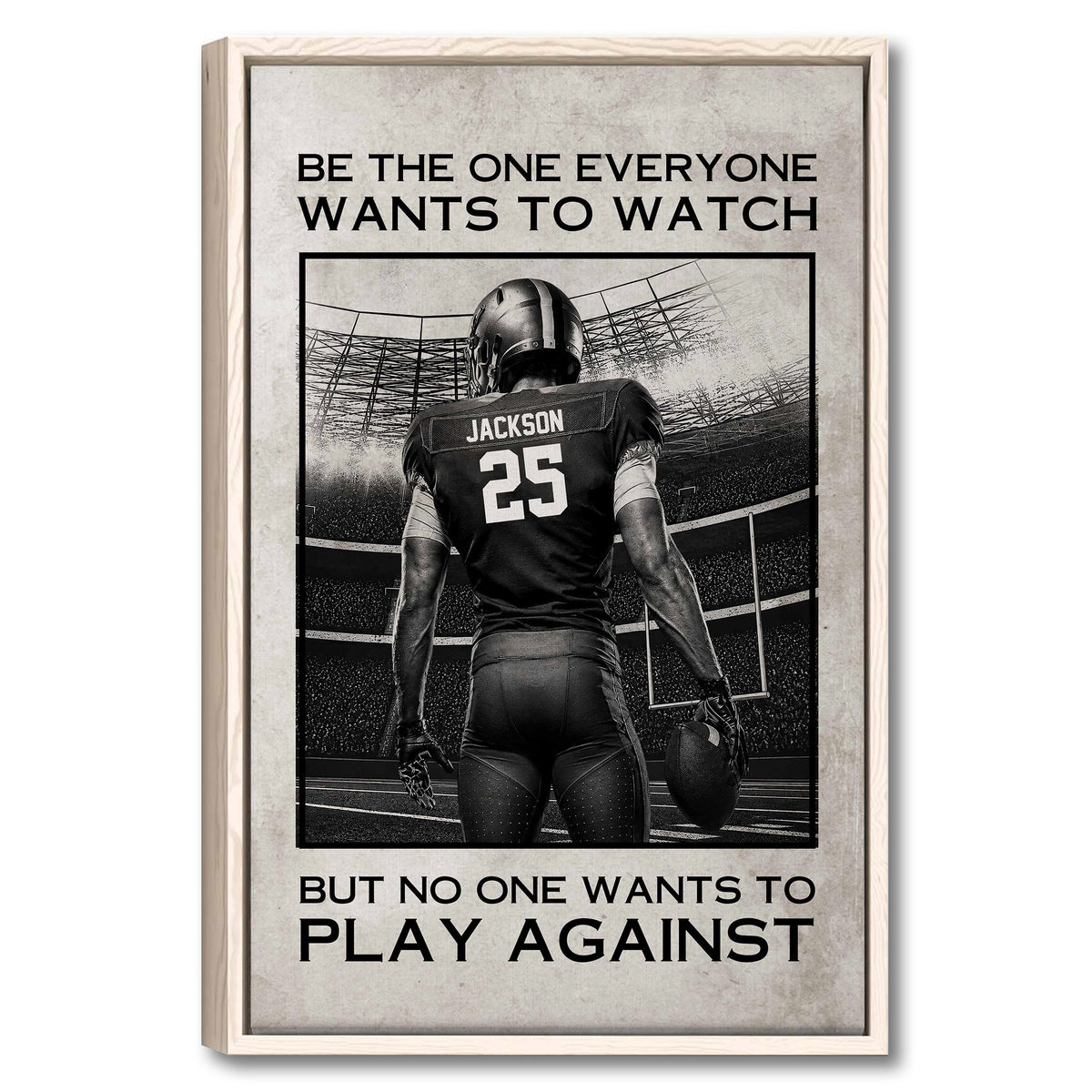 Framed football wall art showing a player holding a football in a stadium with bold black and white typography