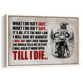 Framed motocross wall art with a dirt bike rider, rugged mountain trail, and bold black and red typography