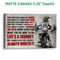 Matte canvas motocross wall art showing a dirt bike rider against a rugged mountain landscape