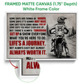 White framed canvas motocross wall art featuring a rider on a dirt bike and motivational design