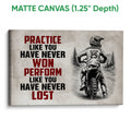 Matte canvas motocross wall art featuring a helmeted dirt bike rider and red and black typography