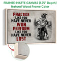 Framed motocross canvas wall art shown with a natural wood frame and close-up edge detail