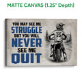 Matte canvas wall art featuring a motocross rider on a dirt bike with bold blue and black artwork
