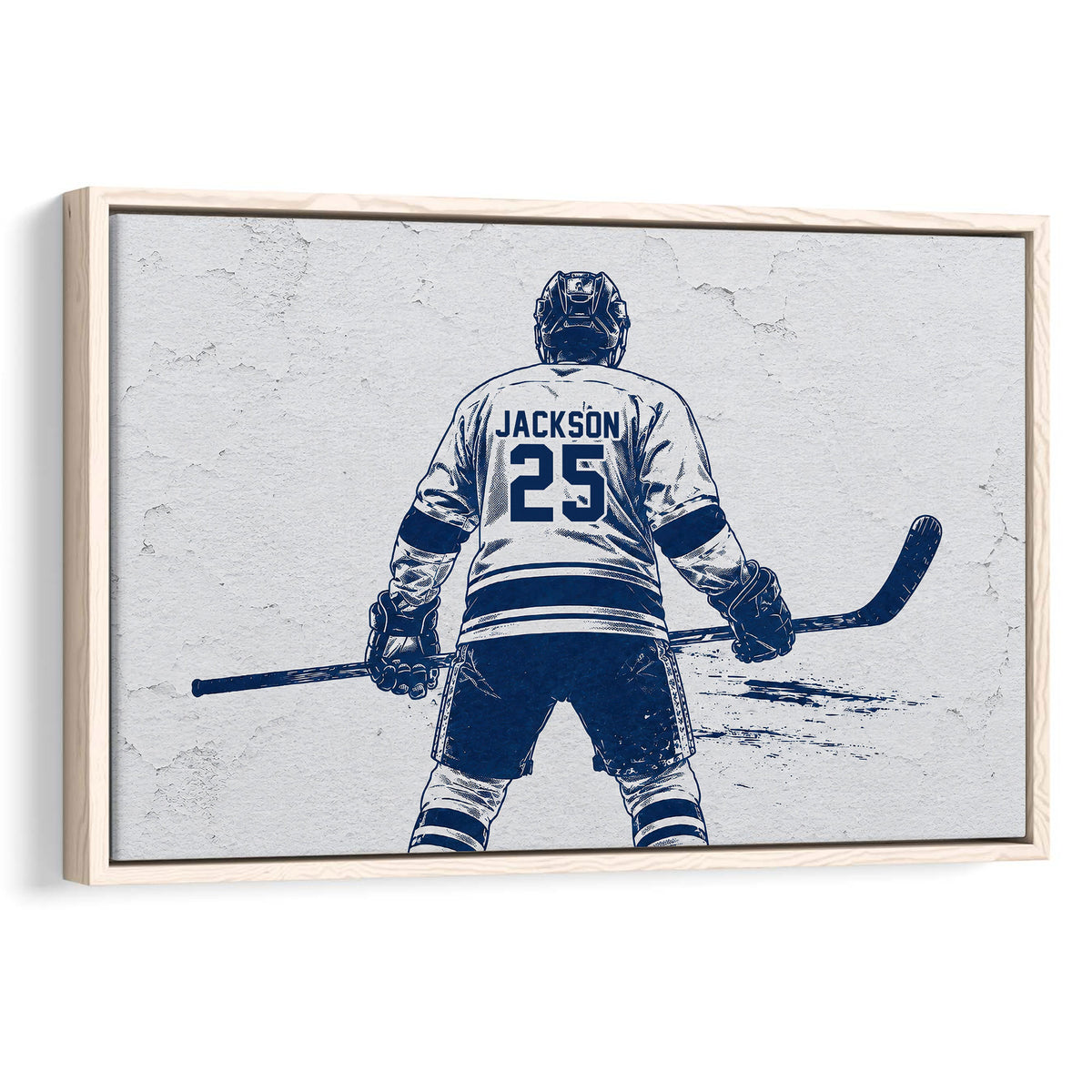 Framed hockey wall art featuring a player with a stick in a navy blue and white illustrated design