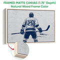 Natural wood framed canvas hockey wall art with a textured player illustration and close-up frame detail