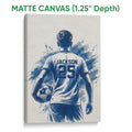 Matte canvas soccer wall art with a rear-view player, ball, and blue brushstroke design