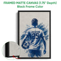 Black framed soccer canvas wall art with a player holding a ball and blue sports artwork