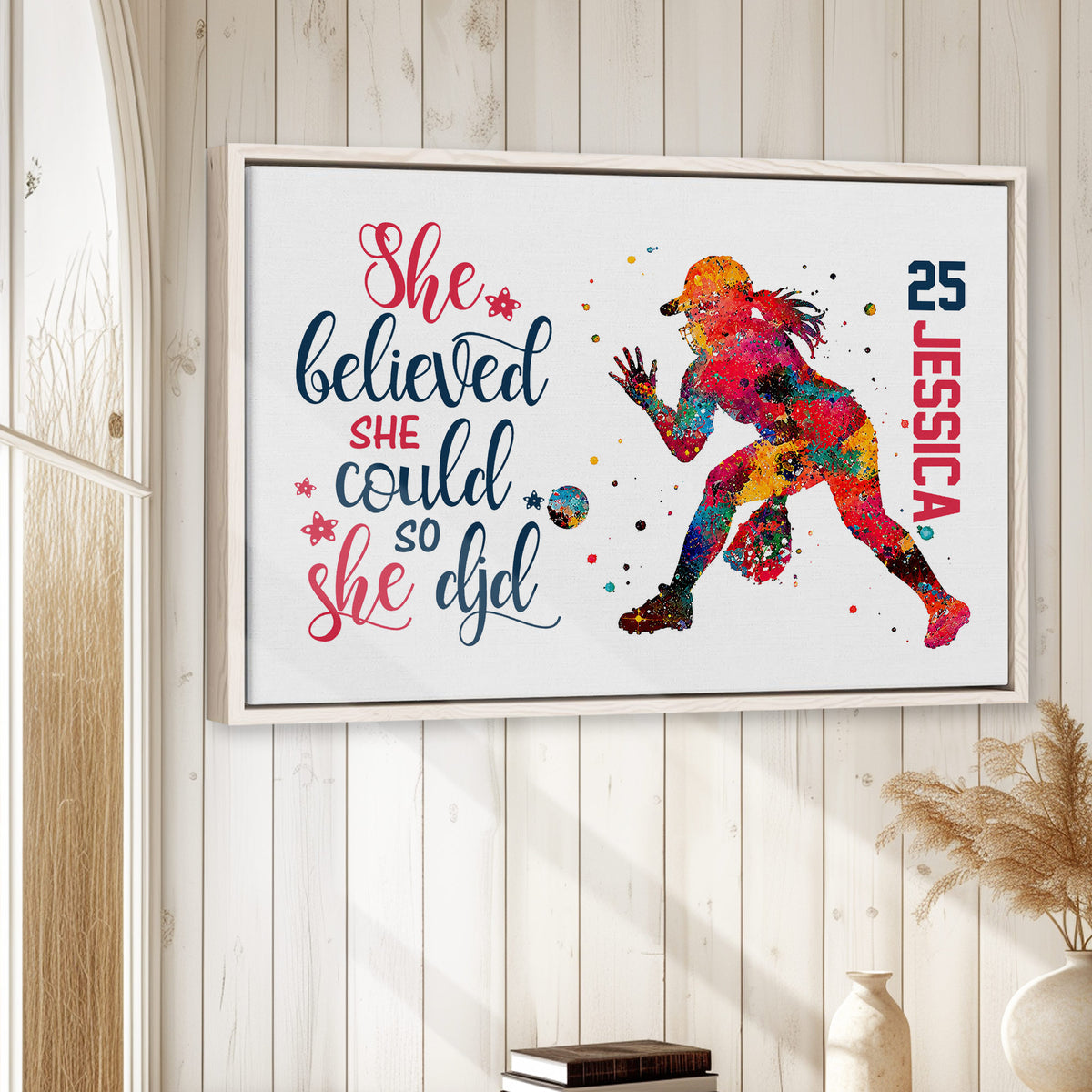 Softball wall art displayed in a bright wood-paneled room with colorful player artwork and motivational lettering