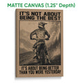 Matte canvas motocross wall art featuring a helmeted dirt bike rider and dramatic mountain scenery