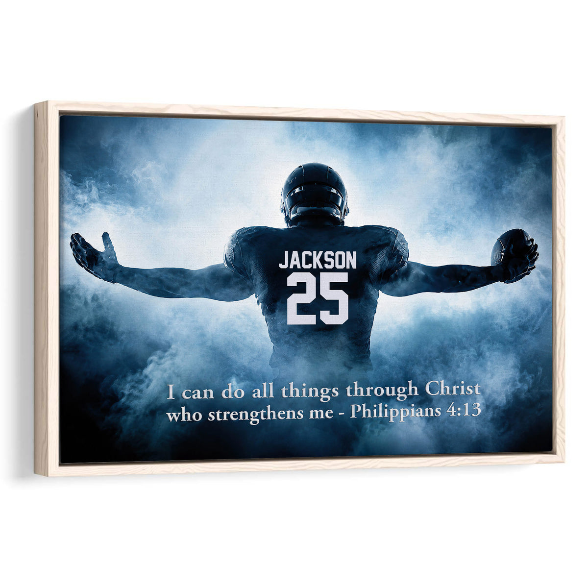Framed football wall art featuring a player in a dark uniform against blue smoke and an inspirational scripture message