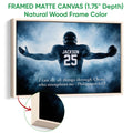 Framed matte canvas football wall art shown with a natural wood frame
