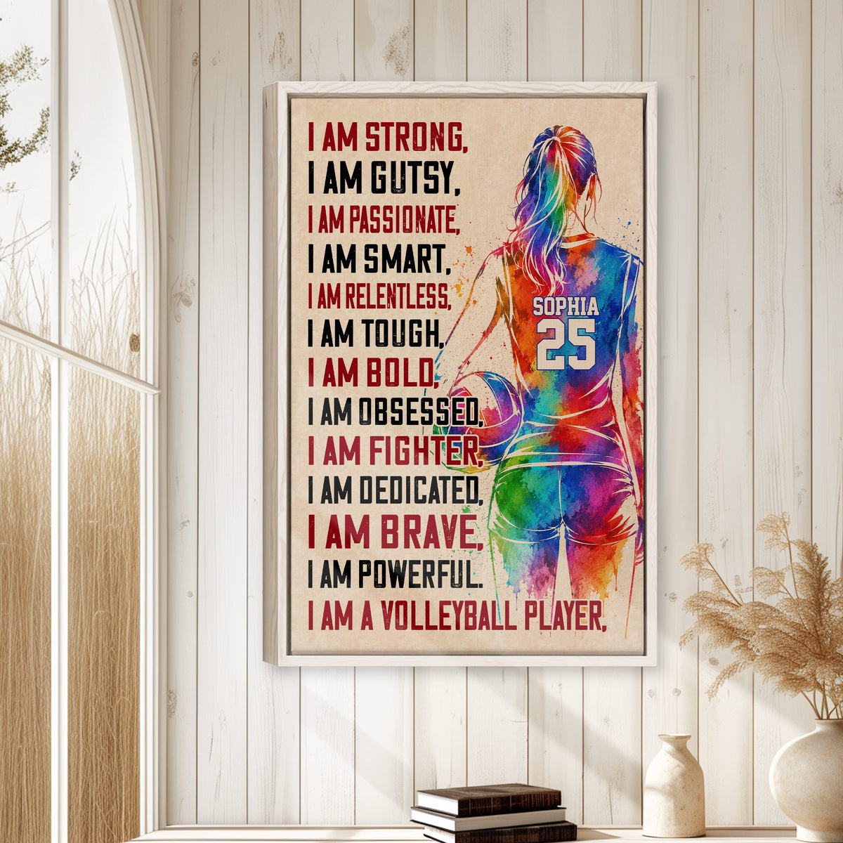Framed volleyball wall art displayed on a light wood wall in a bright home interior