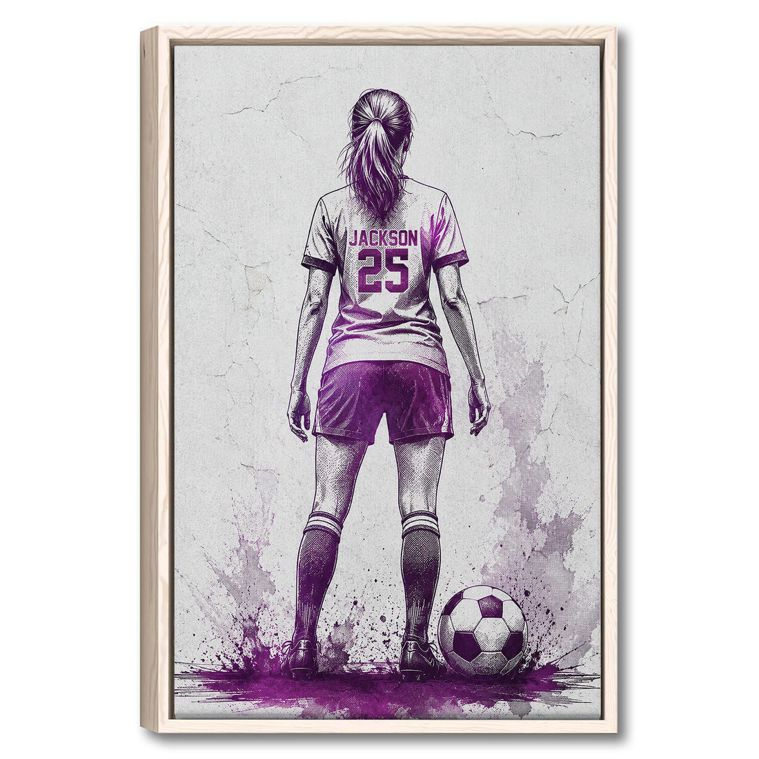 Framed soccer wall art showing a female player from behind with a ball and purple splatter accents